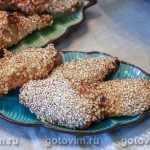 Курячі крильця в абрикосовій глазурі та кунжуті