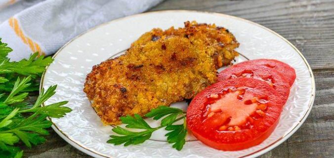 Відбивні зі свинини на пательні в паніровці з кукурудзяних пластівців