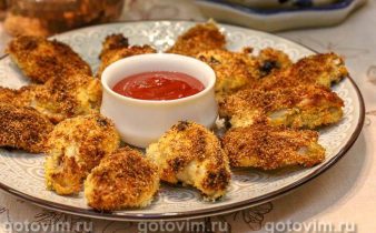 Курячі крильця, смажені в кокосовій стружці